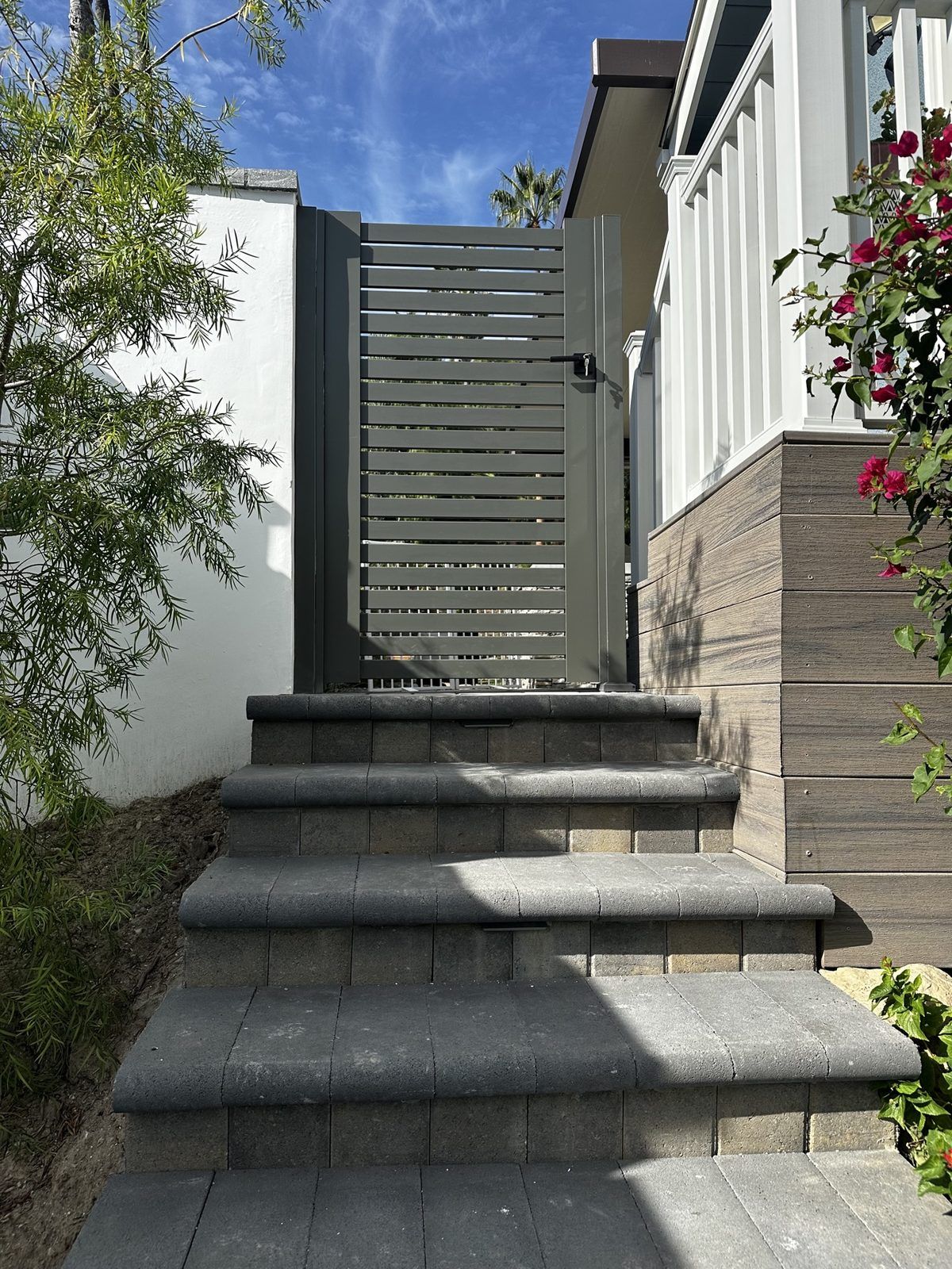Gray aluminum pedestrian gate with horizontal slats, San Fernando Valley