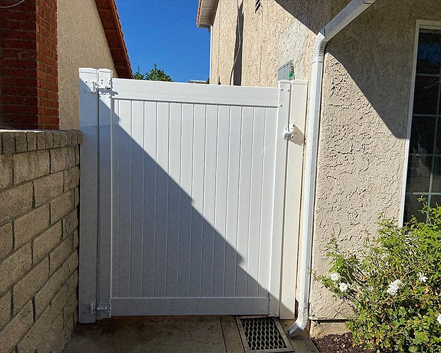 White vinyl pedestrian gate