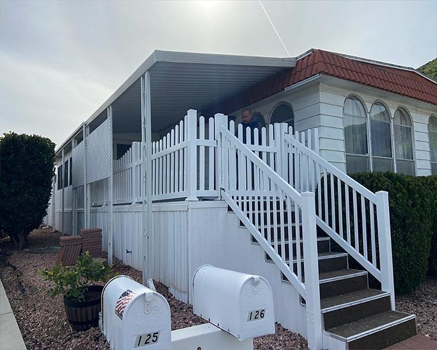 White vinyl porch railing and stairs